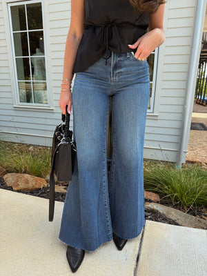 
                  
                    Load image into Gallery viewer, Izzy Mid Rise Wide Leg Jean
                  
                
